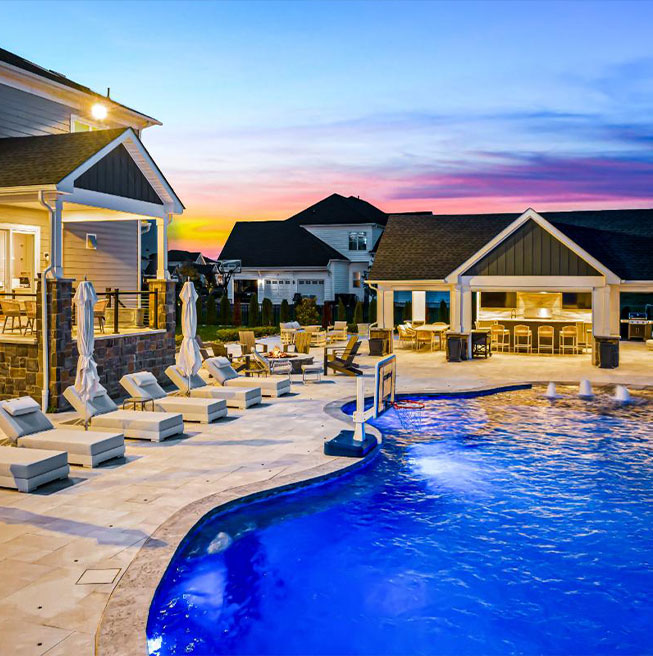 Serene water features enhance this custom luxury pool